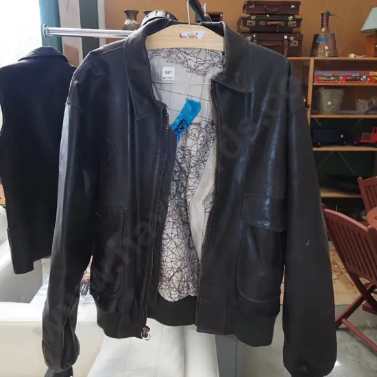 black/brown leather jacket - marks from badges removed