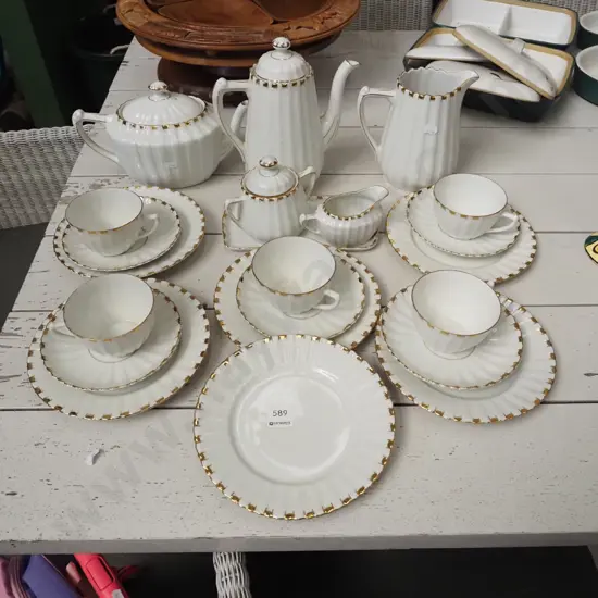white and gold tea and coffee service - with tea pot, coffee pot, cups, saucers etc