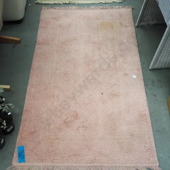 pink woollen floor mat L1440 W830 - marks