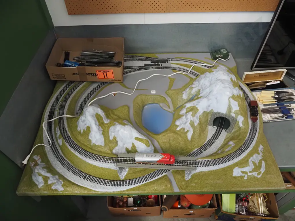 large moulded plastic train layout - tracks, controllers, layout - box in office Image 1++