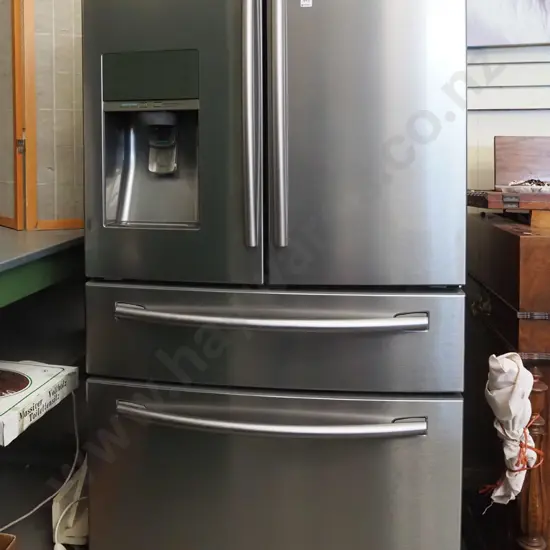 large Samsung fridge/freezer with vege drawer and ice, water and soda water dispenser