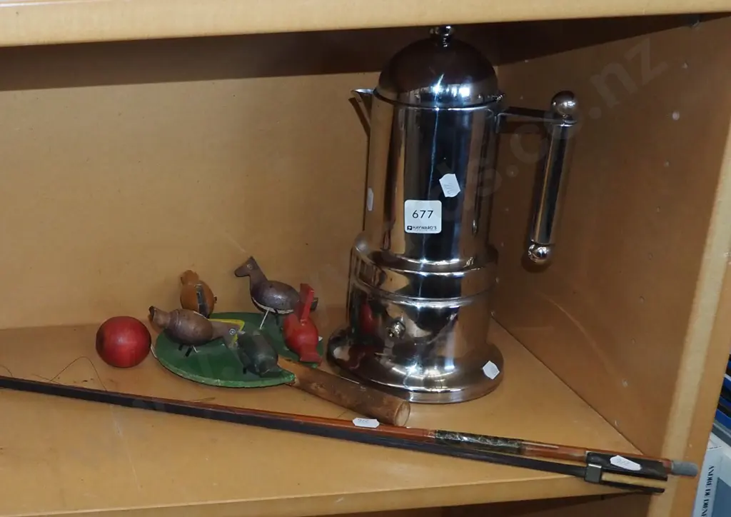 violin bow, wooden novelty toy, stove top Image 1++