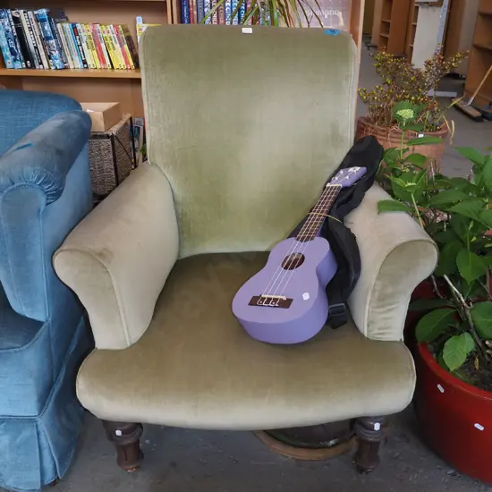 Edwardian turned leg armchair on enamel casters