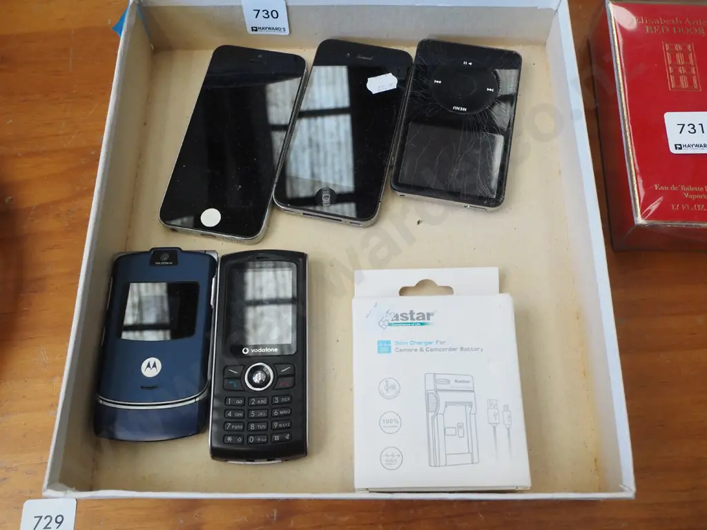 box; cell phones, charger, ipod Image 1++