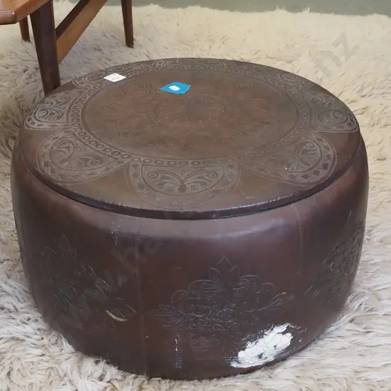 tooled leather? lidded storage ottoman - some marks and deterioration