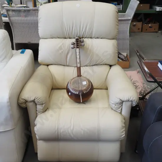 cream leather LaZBoy rocker/recliner - wear, leather needs a clean