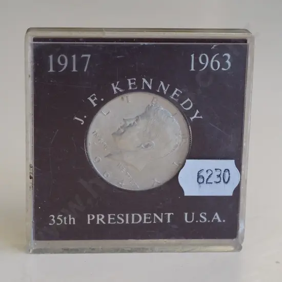 JF Kennedy memorial coin in case