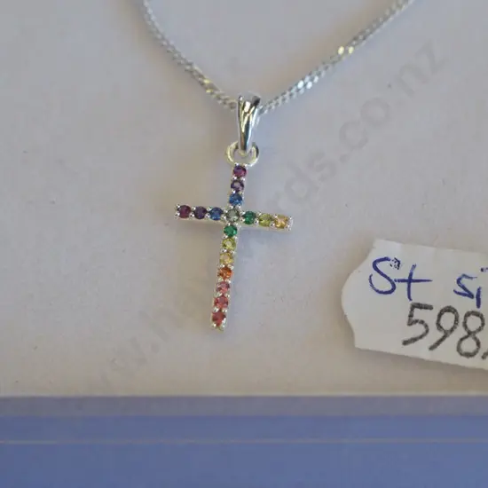  sterling silver crucifix   with multi coloured stones
