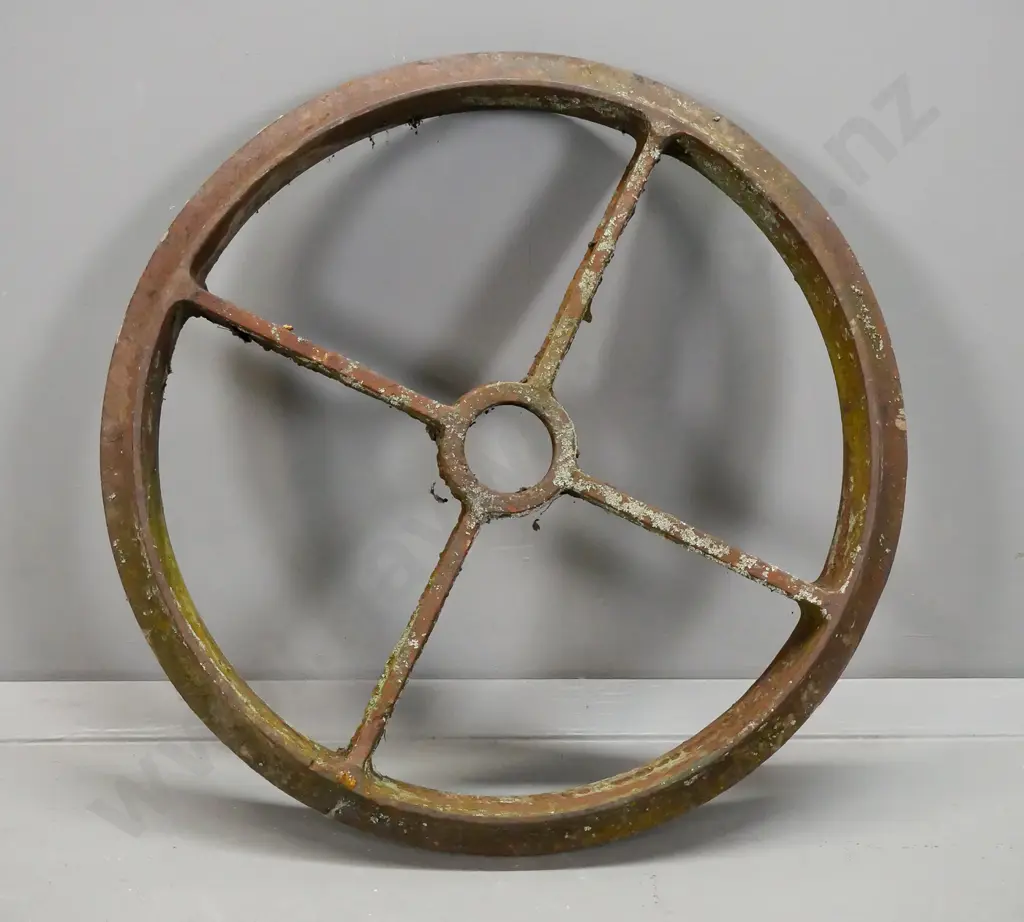 vintage heavy cast iron 4-spoked vehicle or agricultural wheel - age wear & corrosion. Diameter 590. Image 1++