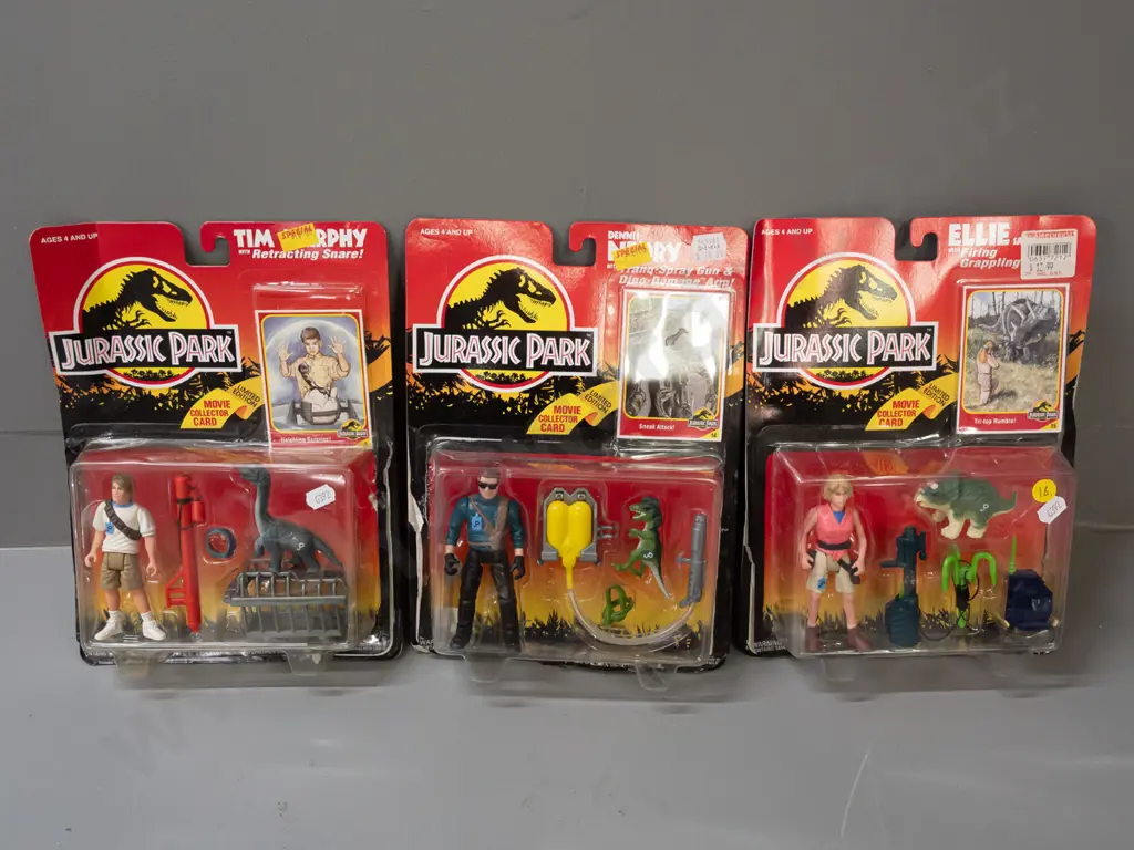 3x carded Jurassic Park 1993 Kenner Toys action figure sets: Ellie, Tim & Dennis - some damage to packaging of all 3 Image 1++