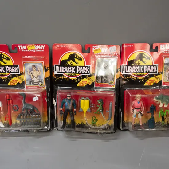 3x carded Jurassic Park 1993 Kenner Toys action figure sets: Ellie, Tim & Dennis - some damage to packaging of all 3