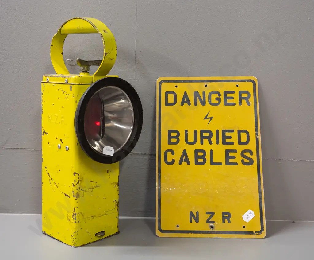 Vintage NZR signal lamp with rotating red/green lens mechanism. Small tin sign 'DANGER BURIED CABLES' NZR Image 1++