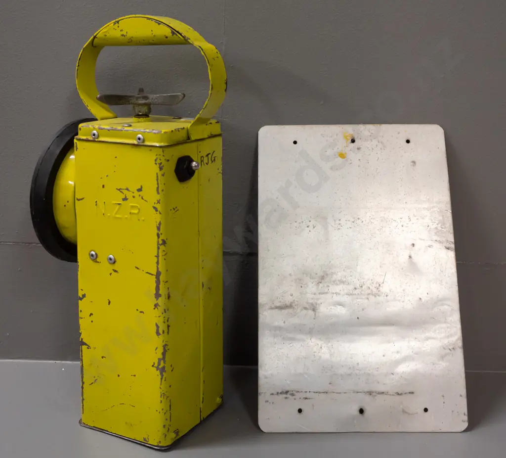 Vintage NZR signal lamp with rotating red/green lens mechanism. Small tin sign 'DANGER BURIED CABLES' NZR Image 1++