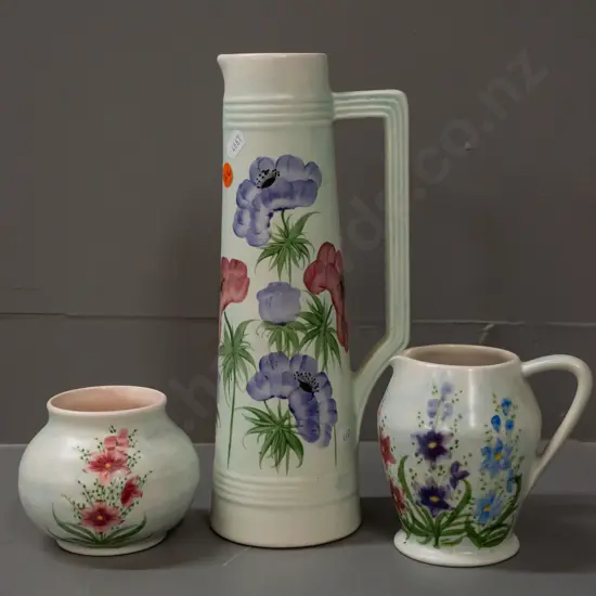 3 pieces of hand painted E. Radford English pottery - 2 jugs and a squat vase - largest is H-280