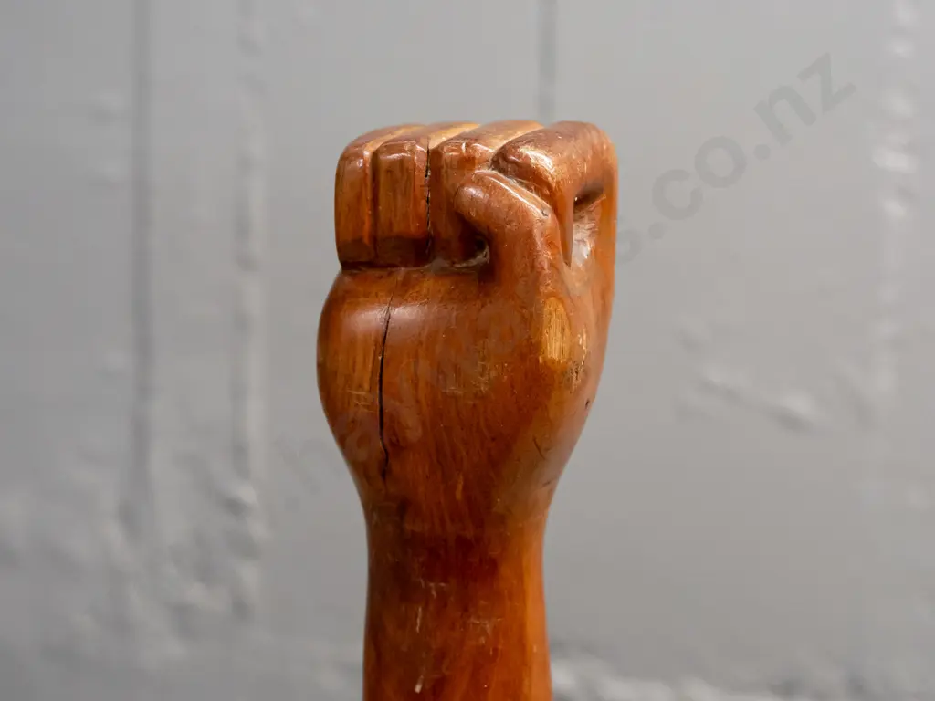 carved wood walking stick with clenched fist handle, Pacific island style motifs, missing ferrule, split thru centre Image 1++