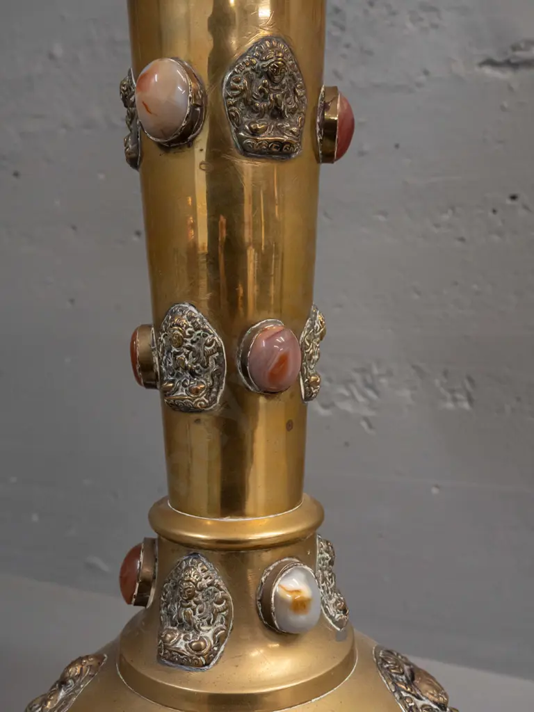 brass table lamp with applied Buddha and mythical beast decoration and inset stone or glass cabuchons - 3 are missing. Image 1++