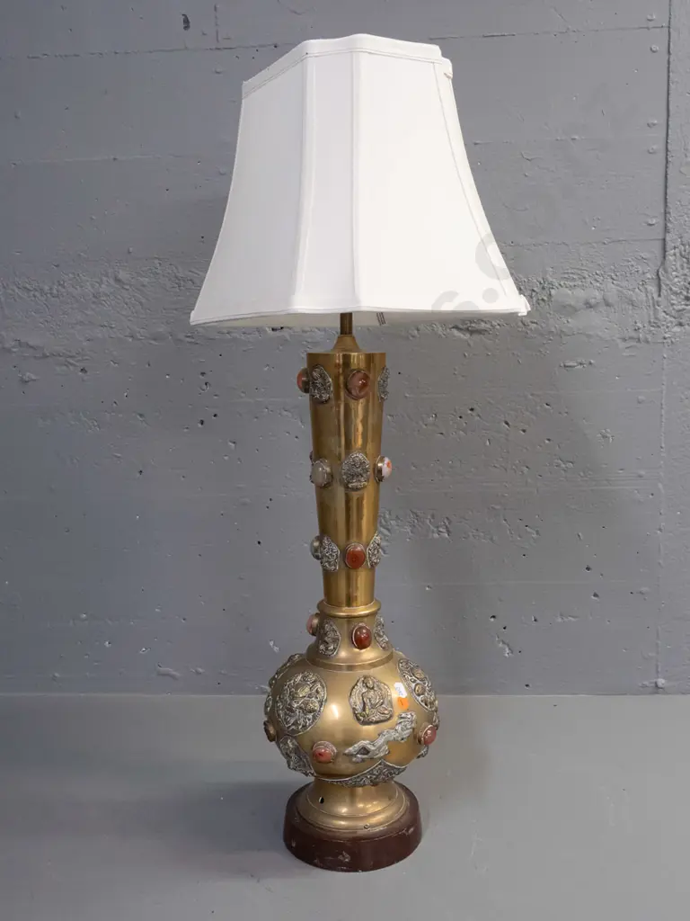 brass table lamp with applied Buddha and mythical beast decoration and inset stone or glass cabuchons - 3 are missing. Image 1++