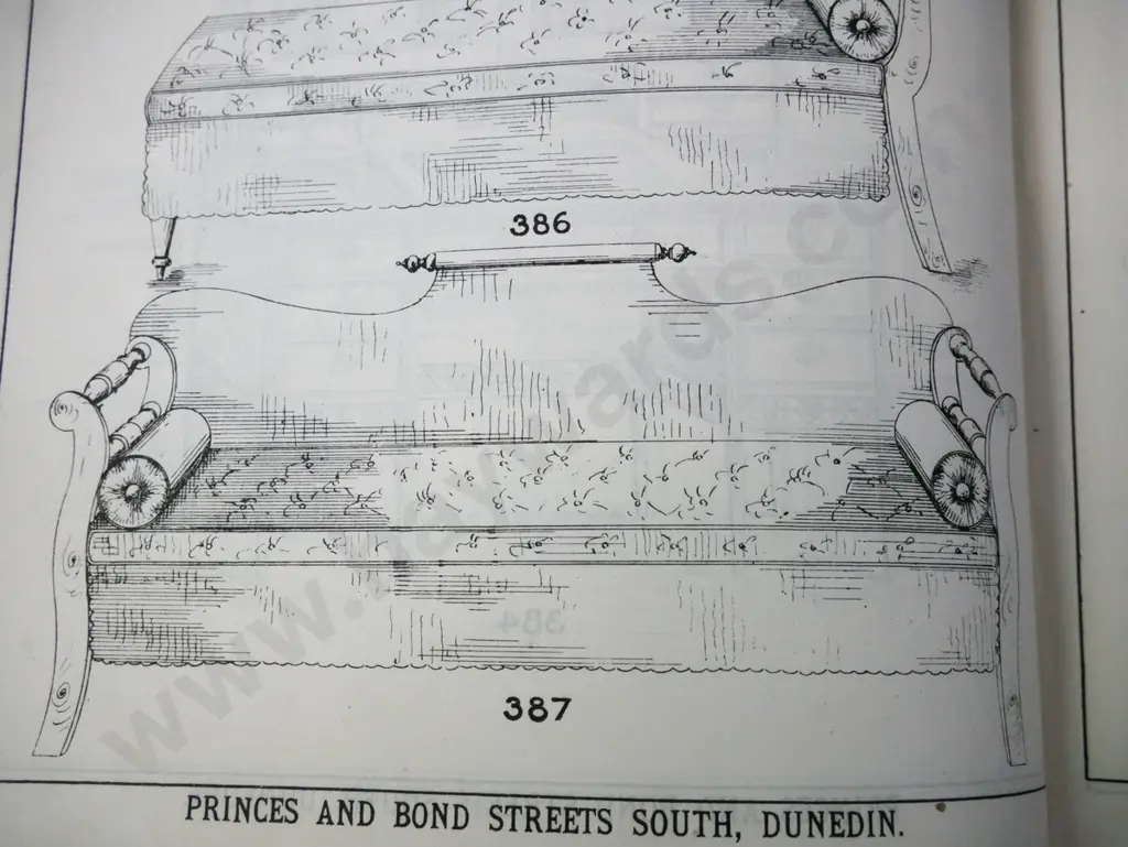colonial rimu shearer's couch with rolling pin back, rolled and turned ends, foam squab on slatted base. Splits to Image 1++