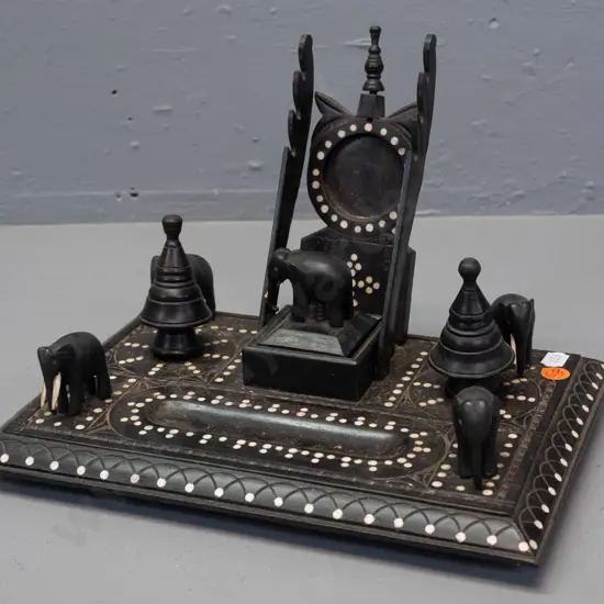 carved ebony and bone desk set with elephants, elephant-lidded compartment, 2 lidded lidded containers, inset bone