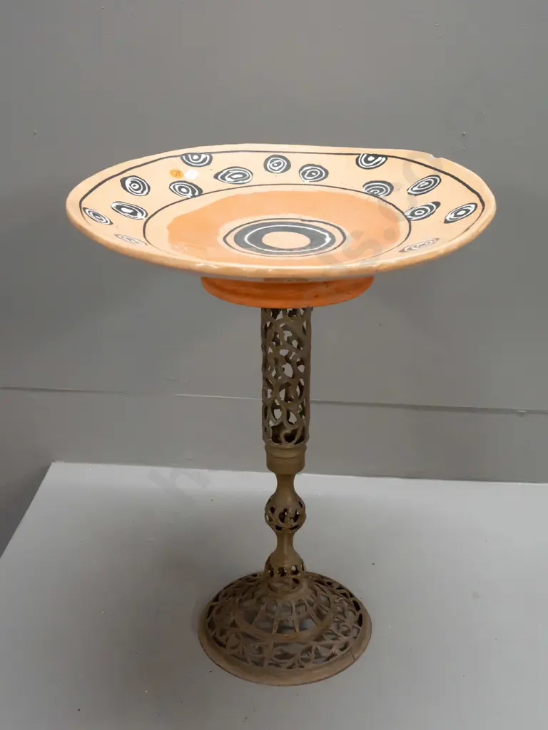 bird bath with pierced brass stem and terracotta bowl decorated with concentric circle motifs - some crazing, fretting Image 1++