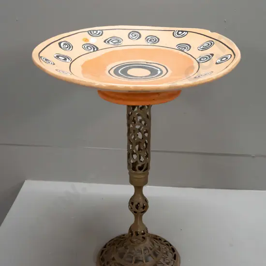 bird bath with pierced brass stem and terracotta bowl decorated with concentric circle motifs - some crazing, fretting
