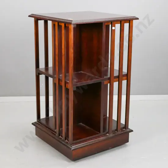 reproduction mahogany 3-tier revolving bookcase with slatted sides. Some scratches & staining to top. H-820 W-480 D-480