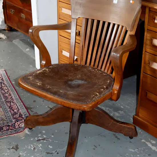 vintage oak office chair with leather upholstered seat - some stains, scratches, wear to leather