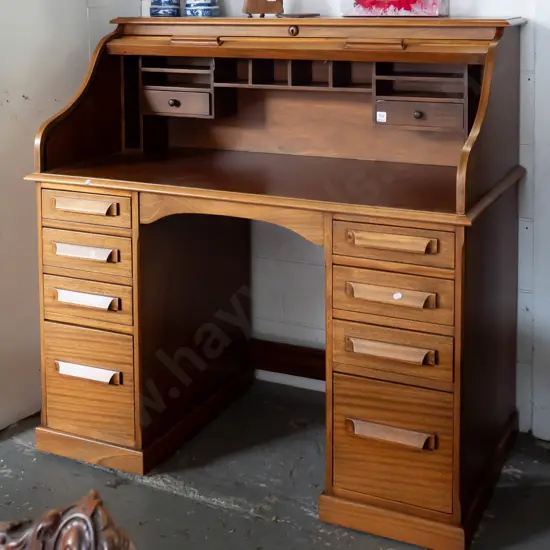 Oak refinished 10-drawer roll top desk. H1160 W1175 D620