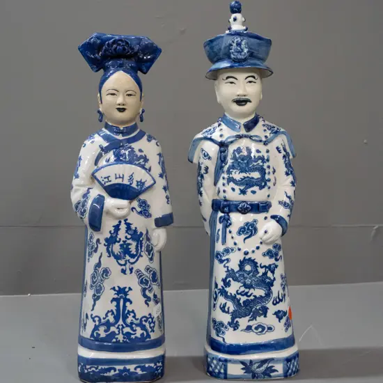 pair of Chinese blue and white figures - male and female - taller is H-380