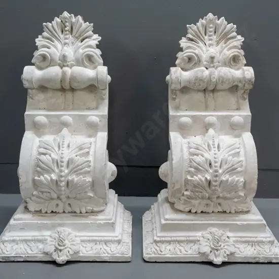 pair of cast plaster decorative architectural corbels with top plate / base for display - two have repairs, all with