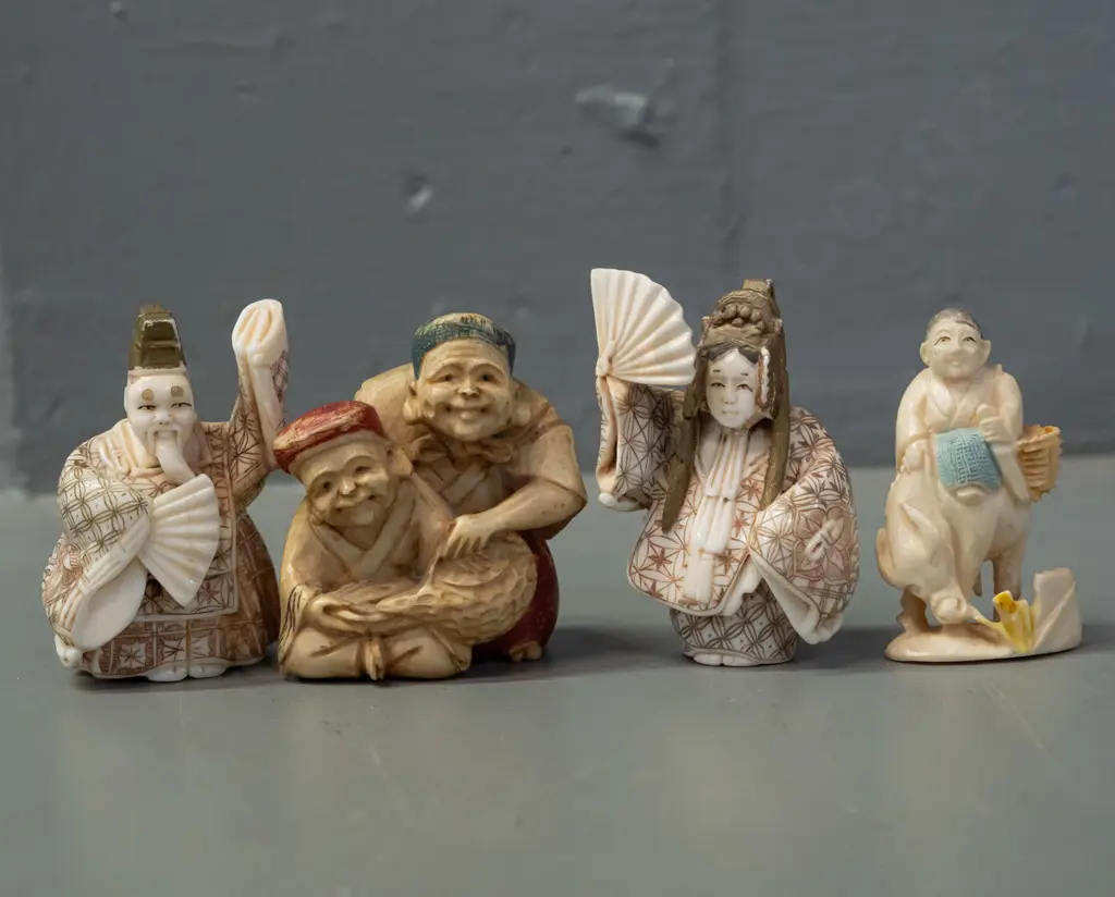 4 faux ivory or bone figures and/or netsuke Image 1++
