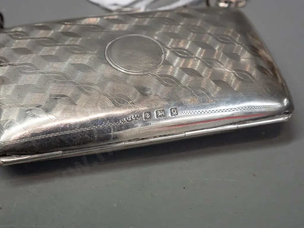 Small sterling silver coin purse w/leather interior and chain handle. Some scratches and dents. H-55 W-95 Image 1++