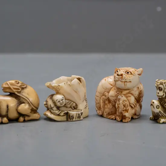 4 faux ivory or bone figures and/or netsuke - animals and mythical beasts