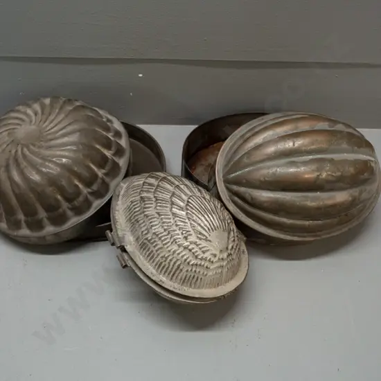 3 vintage pressed metal baking and/or chocolate moulds - some corrosion / verdigris, remnants of copper plating. Largest