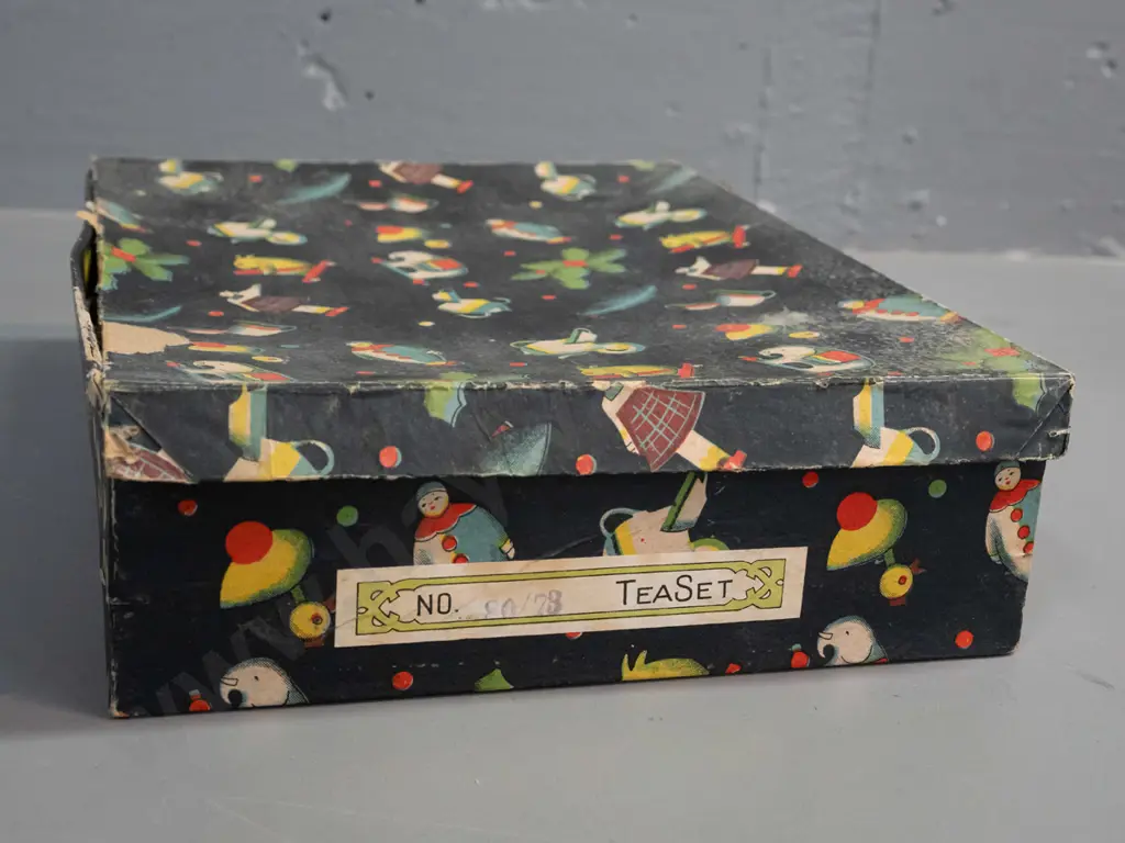 boxed child's tea set with witch riding a goose motif - 3 cups & saucers, teapot, cream & sugar - wear to box Image 1++