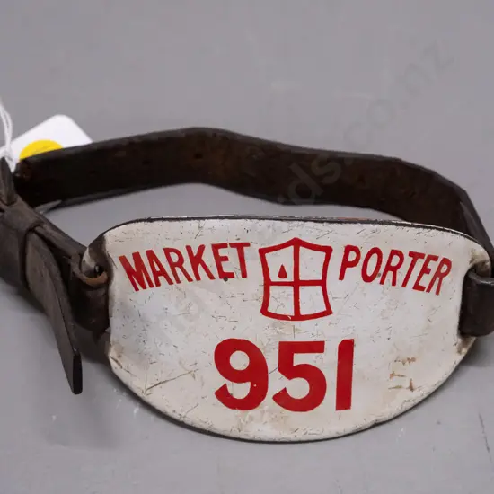 Vintage Market Porter ID badge enameled metal with leather strap. Age wear and scratching. Badge H-65 W-110