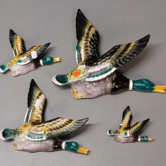 set of 4 graduated size flying wall ducks - no maker's marks, large one has obvious repair and small wing chip, other 3