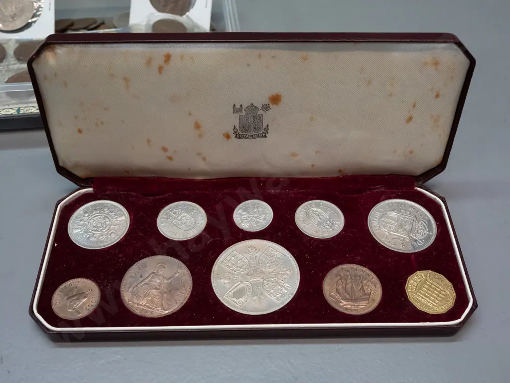 cased English Royal Mint 1953 coronation coin set and a container of assorted coins including some New Zealand Image 1++