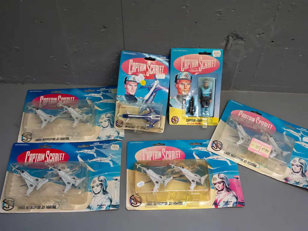 6 carded Captain Scarlett toys in original packaging -   Captain Blue with laser bazooka, Captain Blue's Spectrum Jet Image 1++