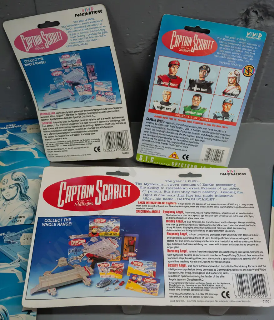 6 carded Captain Scarlett toys in original packaging -   Captain Blue with laser bazooka, Captain Blue's Spectrum Jet Image 1++