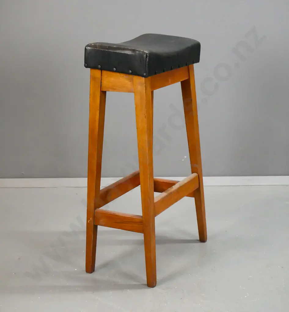 vintage rimu tall stool with slightly saddled and slanted leather upholstered seat H-810 W-410 D-240 Image 1++
