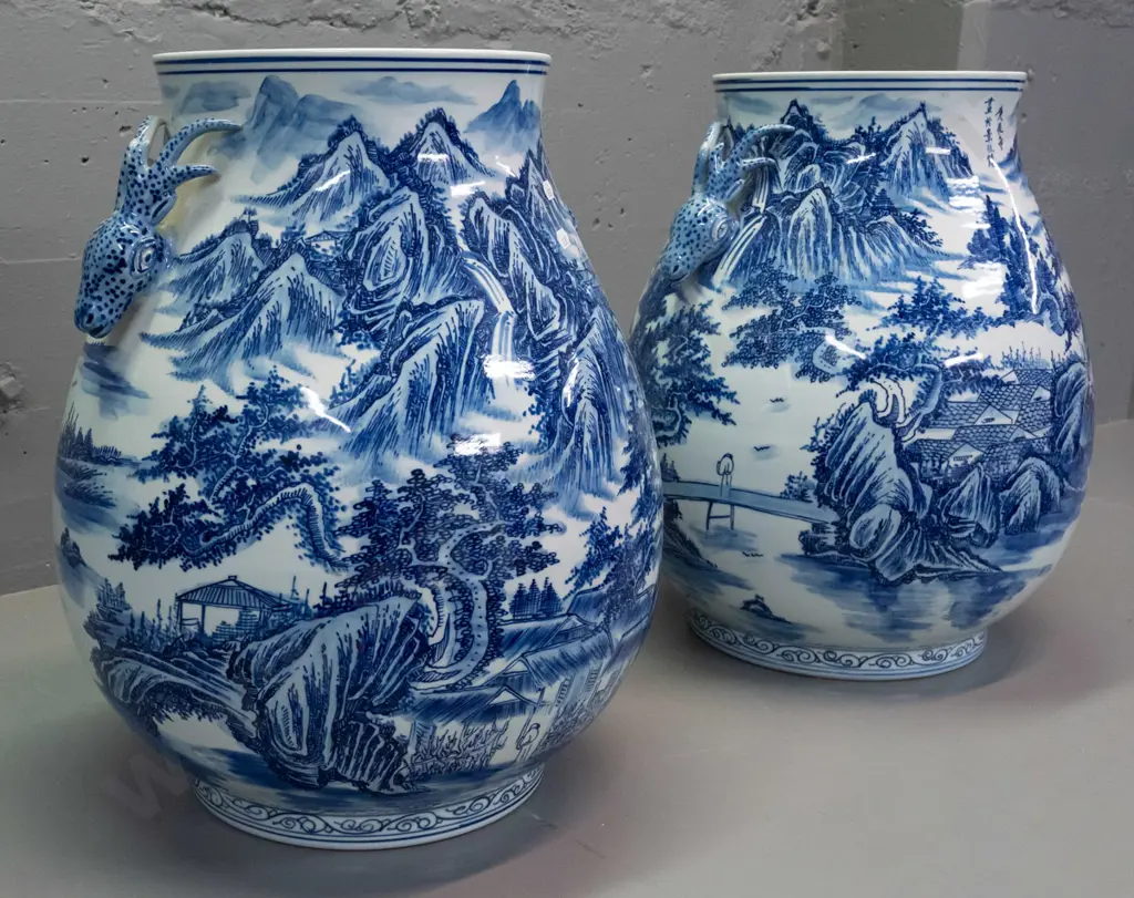 pair of large Chinese blue & white floor vases with flared rim, antelope head handles, landscape & village decoration. Image 1++