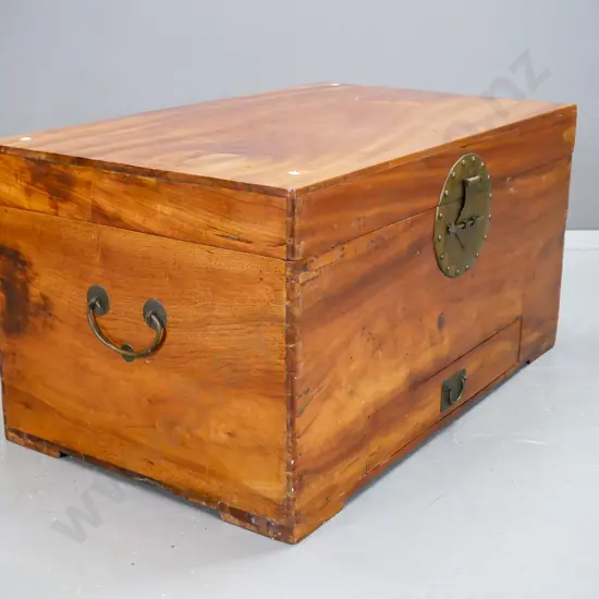 vintage Chinese camphorwood chest with bottom drawer, brass circular latch plate and pin, brass handles, exposed dove-