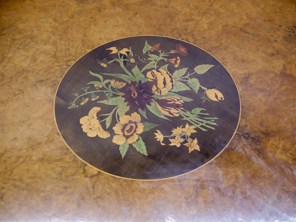 early Victorian walnut round topped centre table with harewood and fruitwood inlaid designs in top, working tilt top Image 1++
