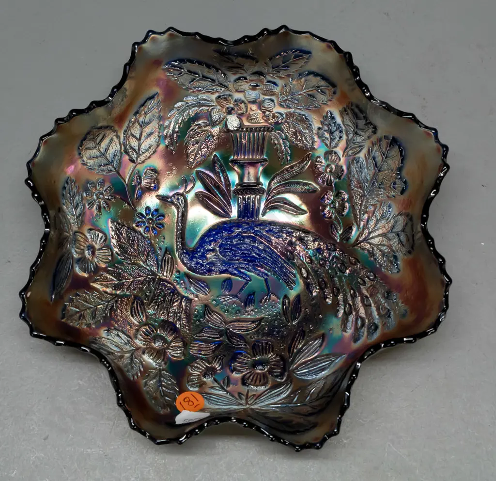 frilled rim carnival glass bowl in blue lustre peacock design, with hanging wire around base D-220 Image 1++