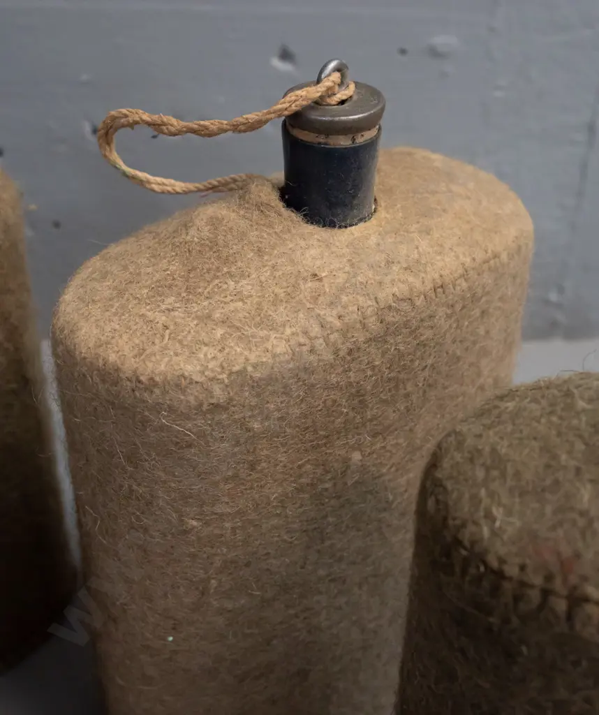 4x WWII-era enameled metal water bottles with felt covers and cork stoppers Image 1++