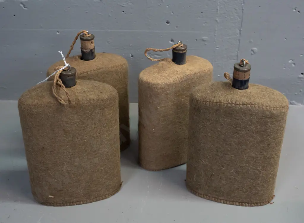 4x WWII-era enameled metal water bottles with felt covers and cork stoppers Image 1++