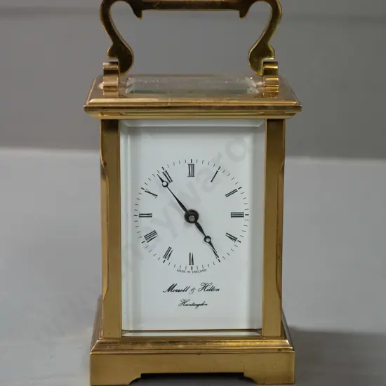 brass carriage clock with bevelled glass panels - marked Morrell & Hilton Huntingdon, movement marked Made in England -