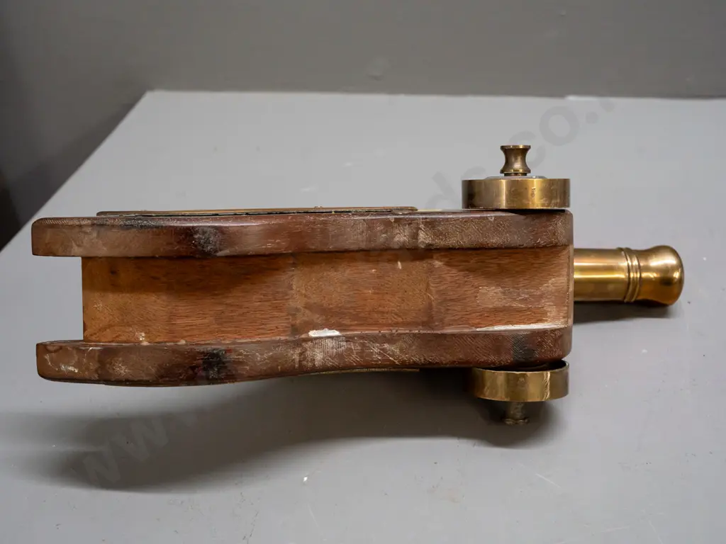 ornamental brass & timber cannon. Some staining & marks to timber. L-300 Image 1++
