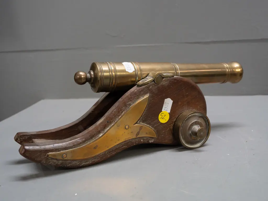 ornamental brass & timber cannon. Some staining & marks to timber. L-300 Image 1++